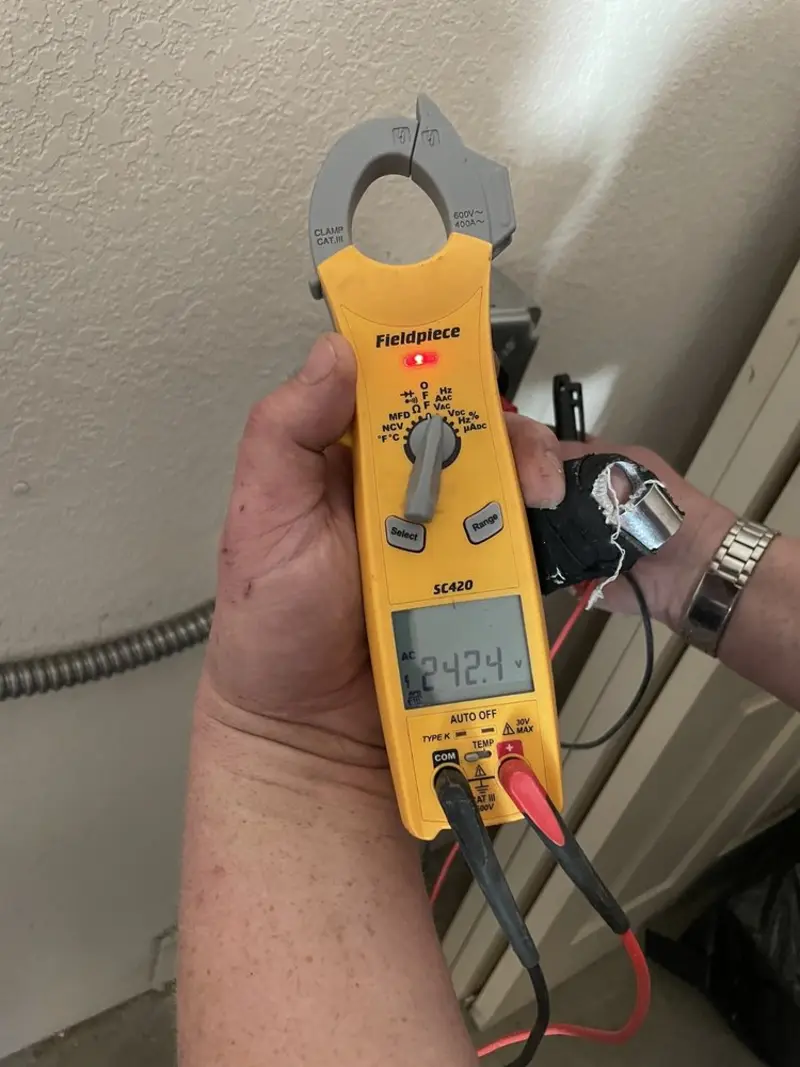 Voltage testing with clamp meter during Circuit Breaker Repair in Broadway
